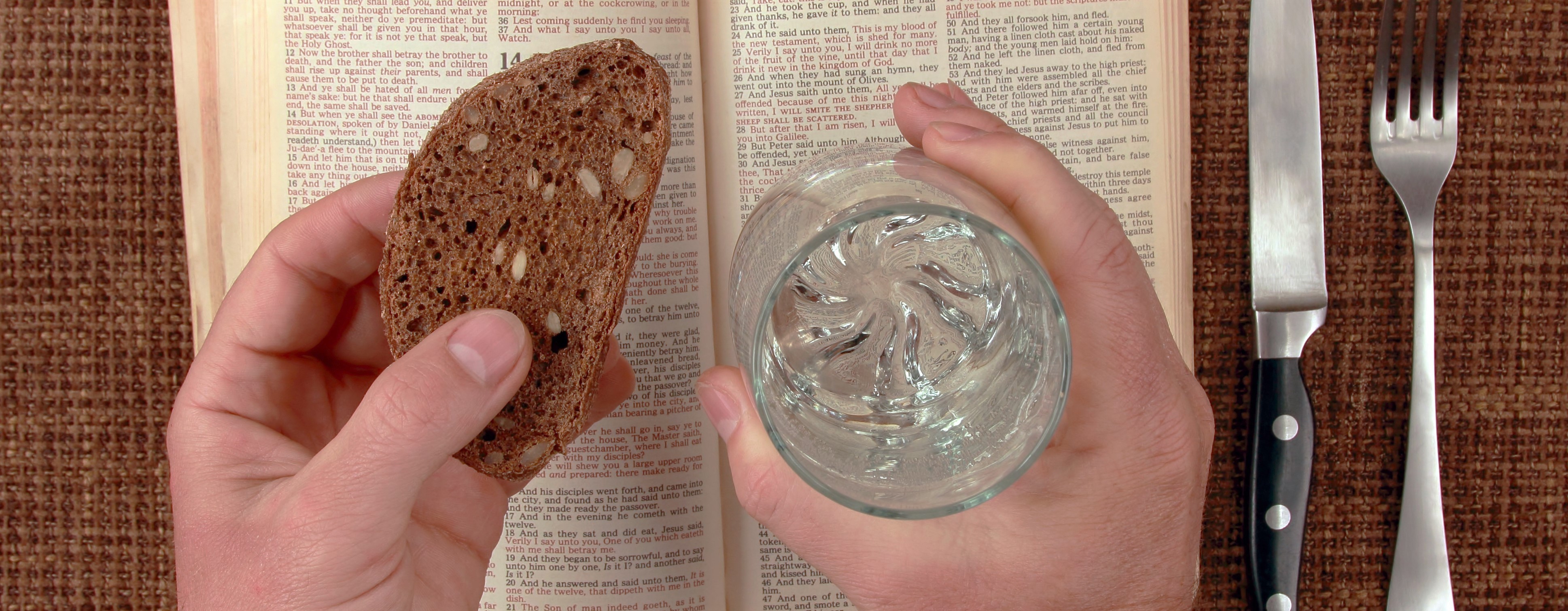 Bible with bread and water