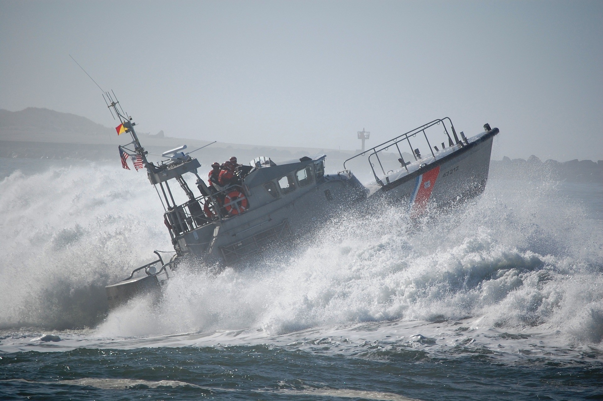 Lifeboat cresting a wave.