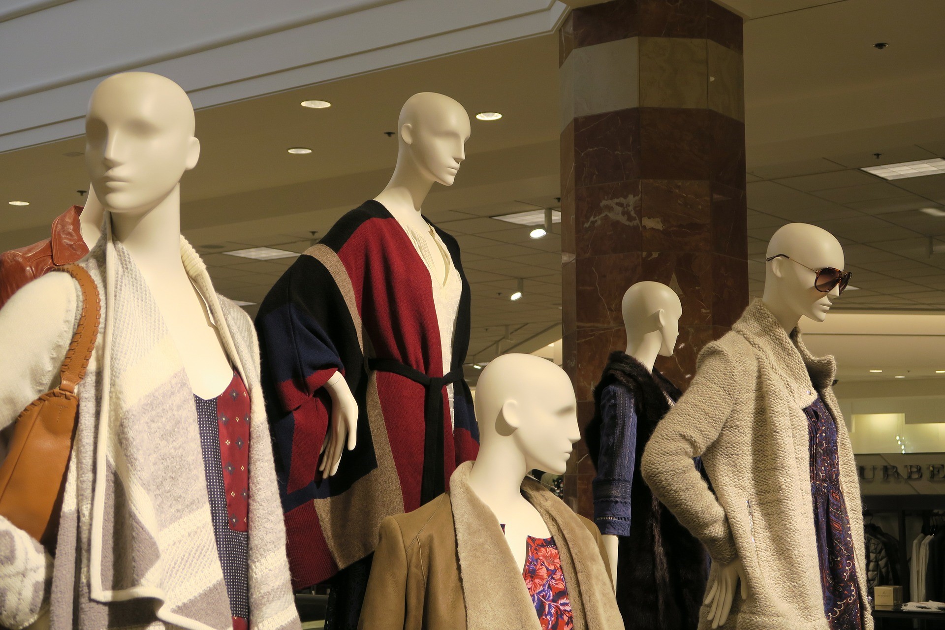 Mannequins in a department store window.