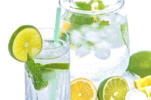 Lemon and lime slices in sparkling water.